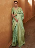 Banarasi Silk Pista Green Traditional Wear Weaving  Saree